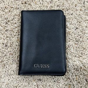 Guess. Black wallet.